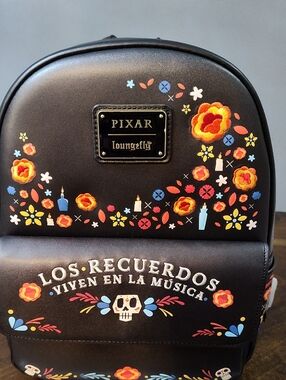 Loungefly Pixar Coco Black Floral Mini Backpack